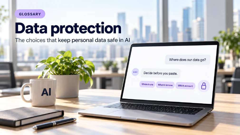 A laptop on a sunlit wooden office desk showing a chat interface where the request "Where does our data go?" is answered with "Decide before you paste." above three violet chips reading Where it runs, What to remove and Which account beside a small violet padlock icon, next to a mug printed with AI, a plant, a notebook and a pen, under a GLOSSARY badge, the heading Data protection and the subtitle The choices that keep personal data safe in AI.